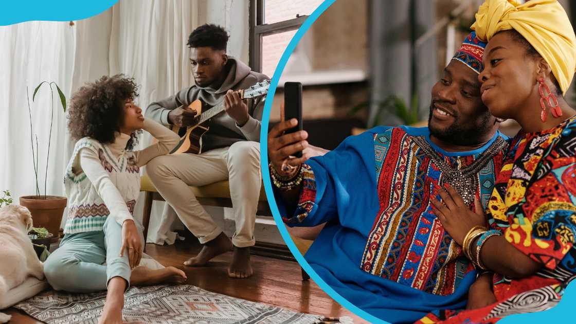 A man playing the guitar for his partner and a couple in colourful African outfits watching something on a smartphone