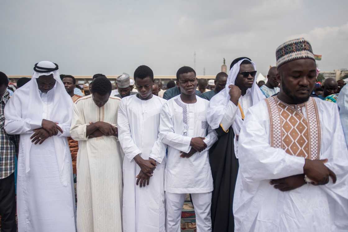 People take part in a prayer during Eid al-Fitr in Accra, Ghana People take part in a prayer during Eid al-Fitr in Accra, Ghana