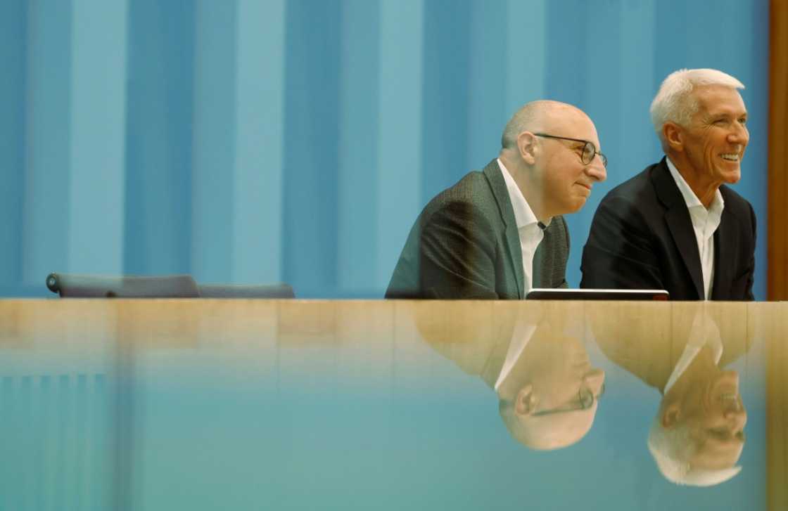 Sinan Selen (L), the designated head of Germany's BfV domestic spy service, and Bitkom president Ralf Wintergerst give a press conference in Berlin Sinan Selen (L), the designated head of Germany's BfV domestic spy service, and Bitkom president Ralf Wintergerst give a press conference in Berlin