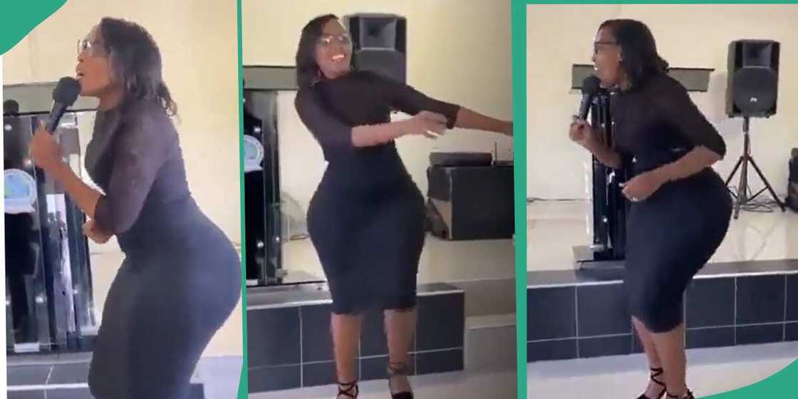 Lady with good shape leads praise and worship.