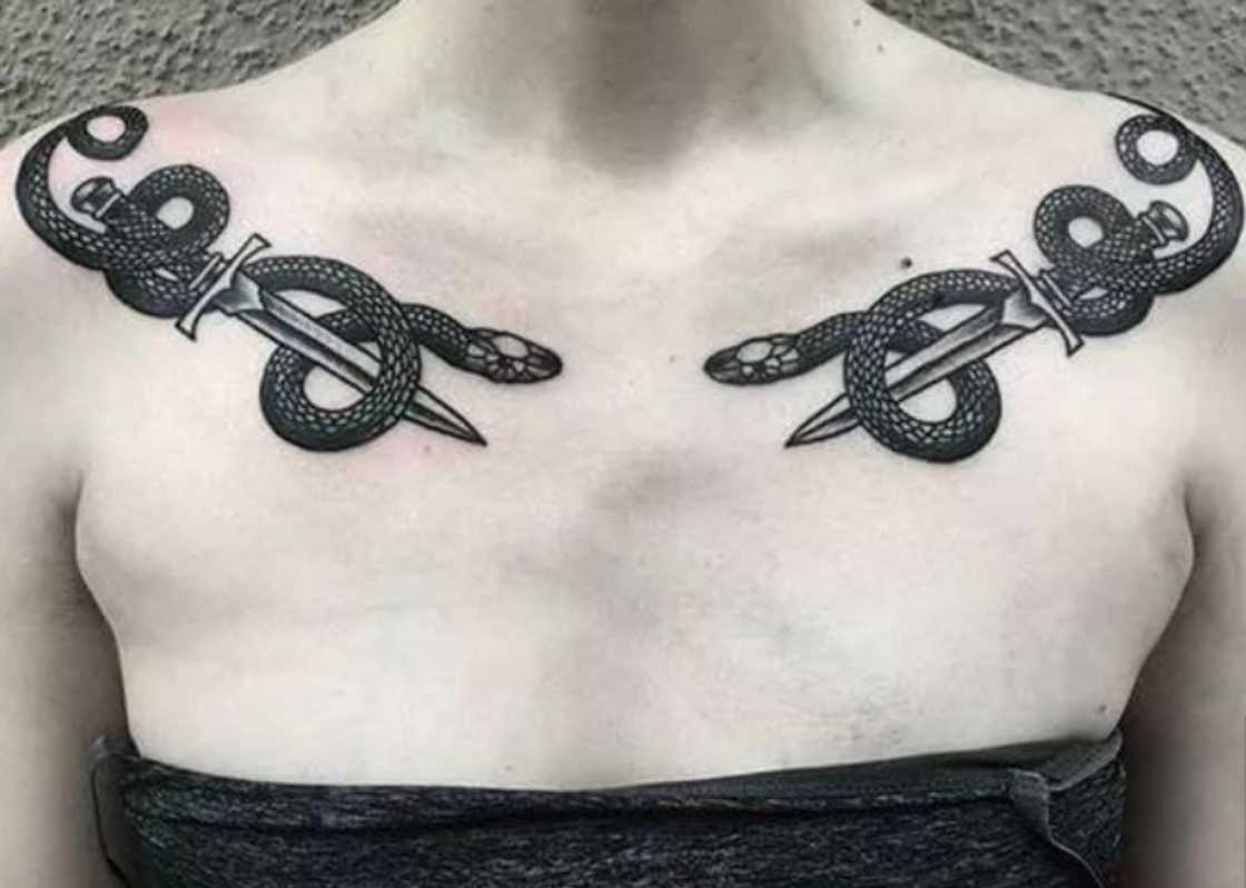 Snake & sword collarbone tattoos