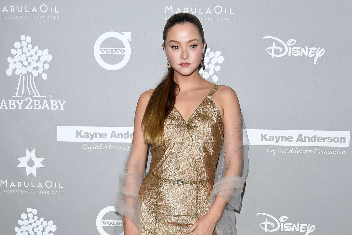 Devon Aoki poses against a wallpaper in Culver City, California Devon Aoki poses against a wallpaper in Culver City, California