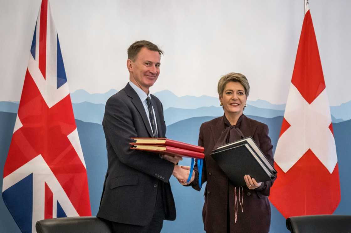 UK and Swiss finance ministers Jeremy Hunt and Karin Keller-Sutter signed the deal in Bern UK and Swiss finance ministers Jeremy Hunt and Karin Keller-Sutter signed the deal in Bern