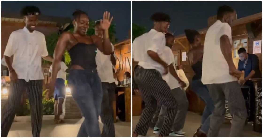 Talented lady in heels leads young men in dance session with intense energy; peeps' can't believe her vigor. Talented lady in heels leads young men in dance session with intense energy; peeps' can't believe her vigor.