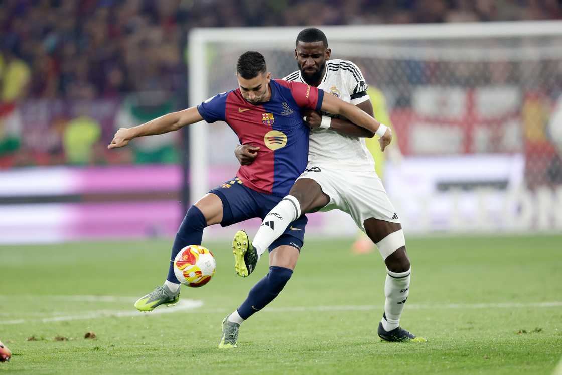 Ferran Torres of FC Barcelona, Antonio Rudiger of Real Madrid during the Spanish Copa del Rey match between Real Madrid v FC Barcelona at the Estadio de la Cartuja on April 26, 2025 in Sevilla Spain Ferran Torres of FC Barcelona, Antonio Rudiger of Real Madrid during the Spanish Copa del Rey match between Real Madrid v FC Barcelona at the Estadio de la Cartuja on April 26, 2025 in Sevilla Spain