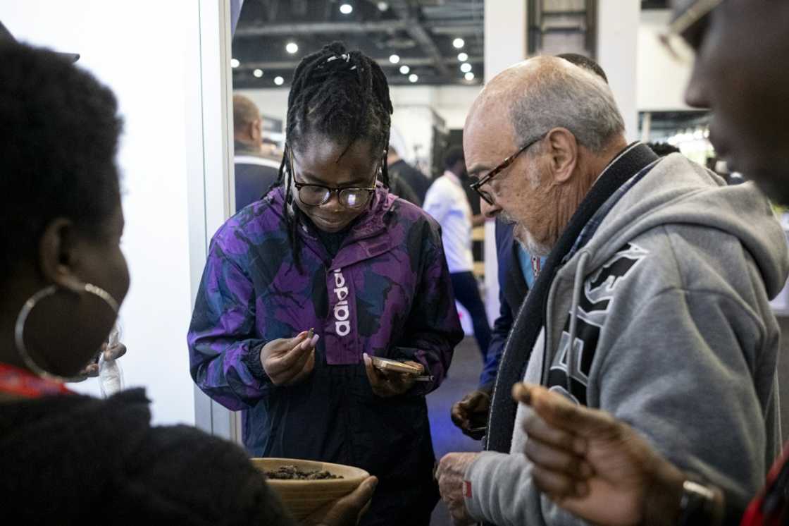 Vesela tried to woo reluctant customers with biscuits and protein bars at a recent food fair in Johannesburg's upmarket Sandton district