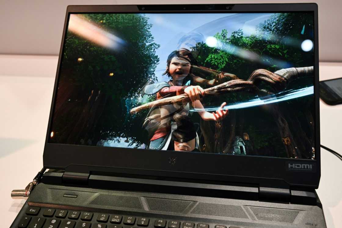 An Acer Predator Helios 300 laptop with eye tracking for glasses-free 3D video gaming is displayed at the CES Microsoft booth An Acer Predator Helios 300 laptop with eye tracking for glasses-free 3D video gaming is displayed at the CES Microsoft booth