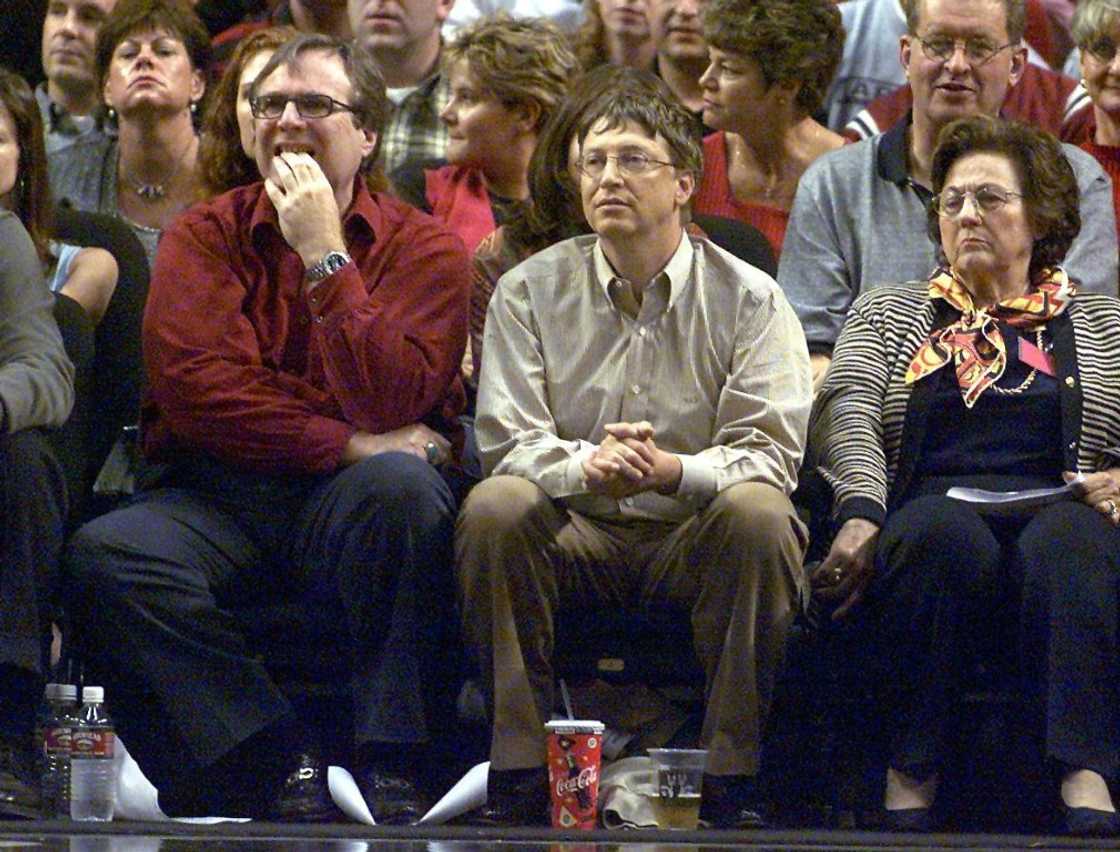 Bill Gates (C) and Paul Allen (L), pictured here at a Portland Trailblazers basketball game in May 2000, founded Microsoft in 1975 with a mission to put computers in every home and office Bill Gates (C) and Paul Allen (L), pictured here at a Portland Trailblazers basketball game in May 2000, founded Microsoft in 1975 with a mission to put computers in every home and office