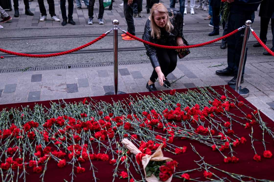 Residents came to lay red carnations at the site of the explosion Residents came to lay red carnations at the site of the explosion