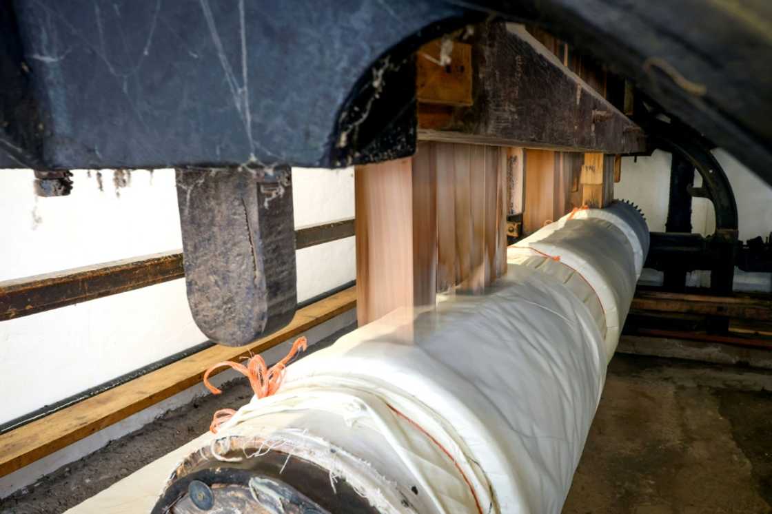 The noise of the hammers on the machine is deafening, but managers at William Clark & Sons, founded in William Clark & Sons was founded outside Belfast in 1736. The noise of the hammers on the machine is deafening The noise of the hammers on the machine is deafening, but managers at William Clark & Sons, founded in William Clark & Sons was founded outside Belfast in 1736. The noise of the hammers on the machine is deafening