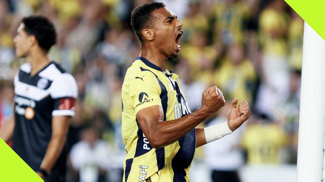 Alexander Djiku celebrates after Fenerbahce defeated Lugano in the UEFA Champions League qualifiers.