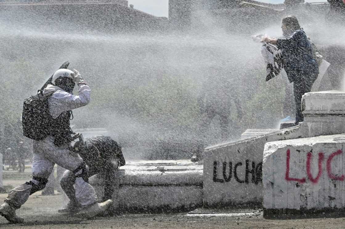 Police used water cannon on the protesters in Chile Police used water cannon on the protesters in Chile