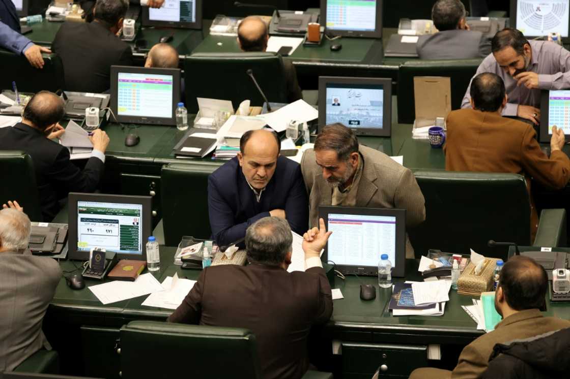 Iranian MPs attend the parliamentary session Iranian MPs attend the parliamentary session