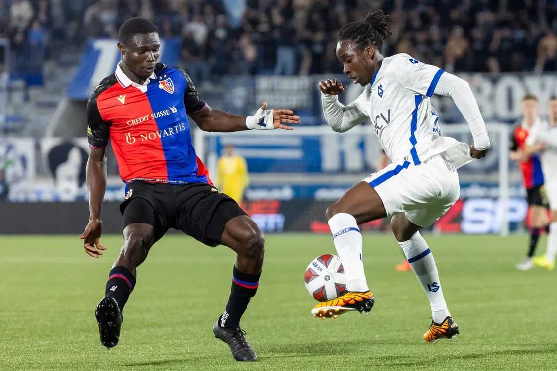Ghana international defender Jonas Adjetey of FC Basel (left) challenges an opponent in a Swiss League match Ghana international defender Jonas Adjetey of FC Basel (left) challenges an opponent in a Swiss League match