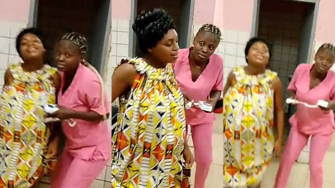 Photo of pregnant lady dancing with nurse Photo of pregnant lady dancing with nurse