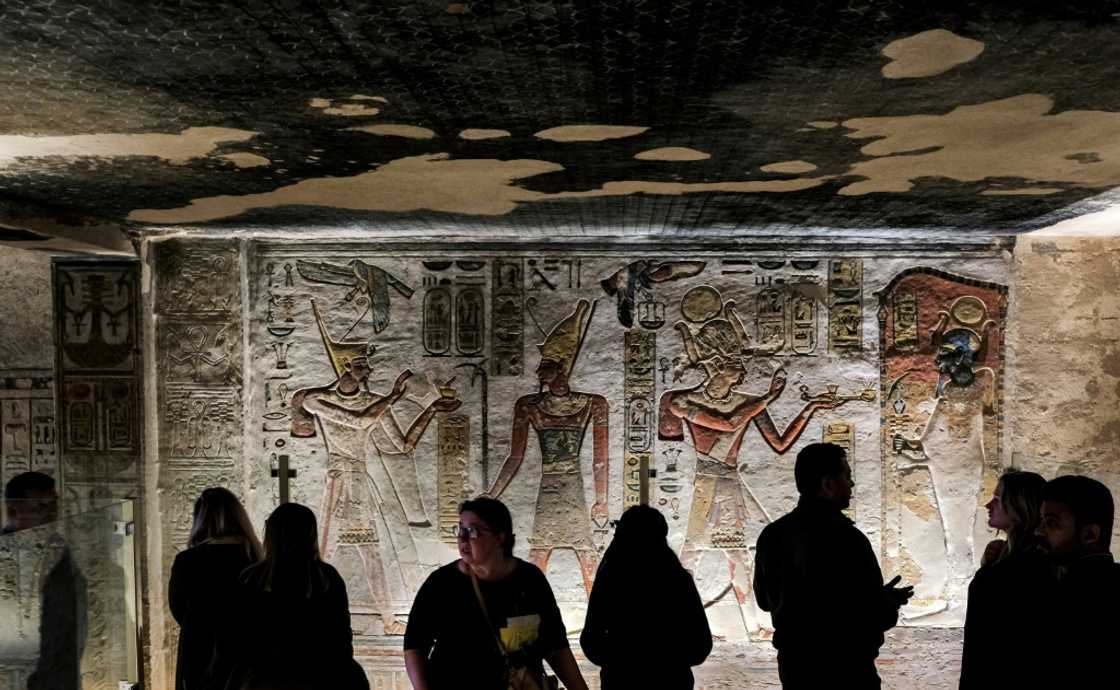 Visitors tour the tomb of Ramses III (1186-1155 BC) in Valley of the Kings at of Luxor