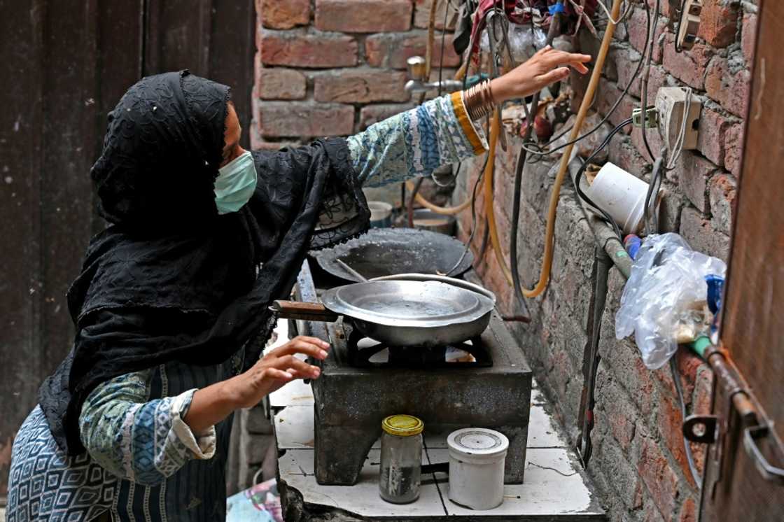 'Life is getting harder every day,' said Babar, a mother of three 'Life is getting harder every day,' said Babar, a mother of three