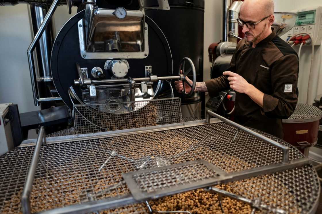 Guido Castagna toasts hazelnuts in his laboratory