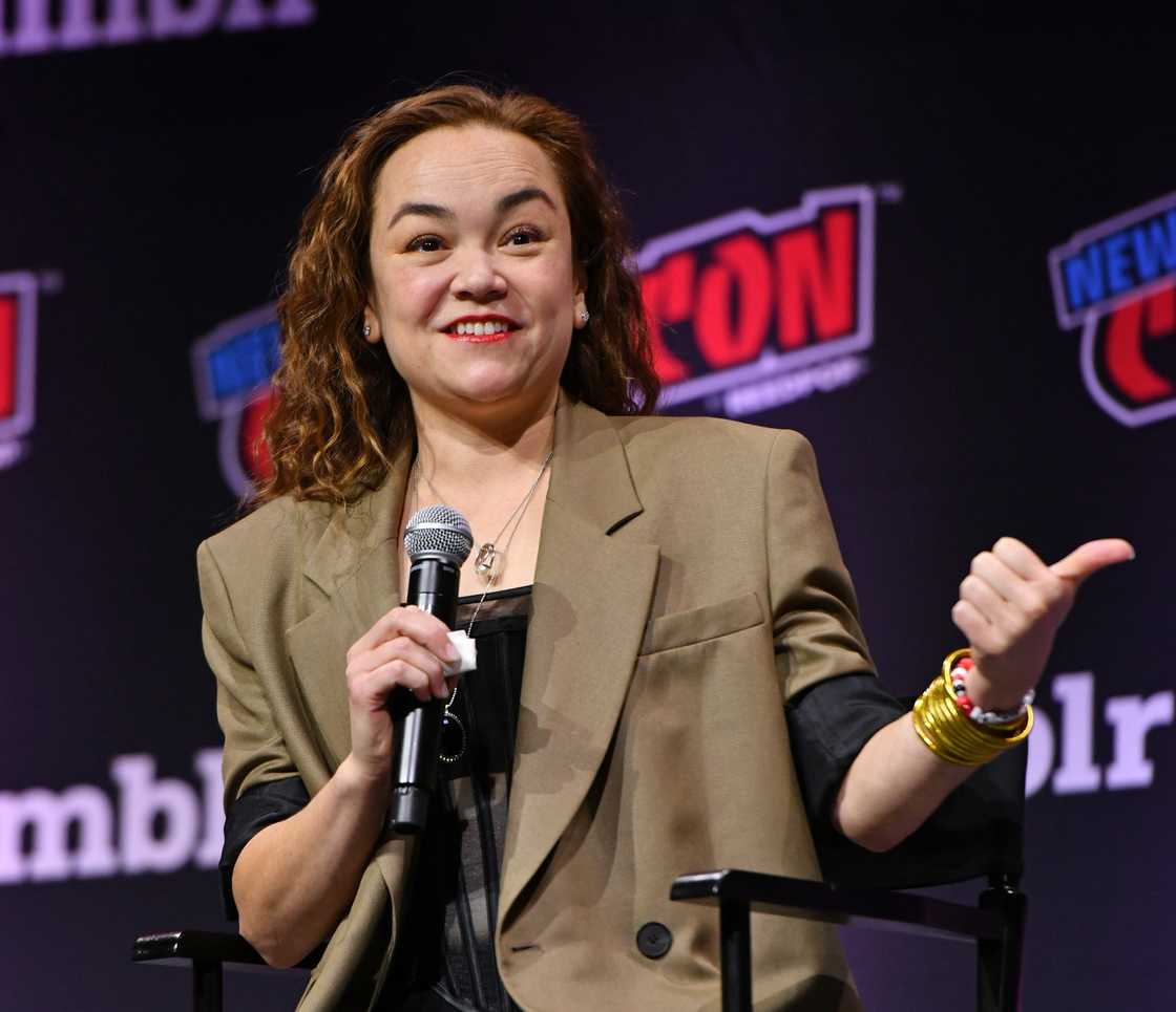 Trina Nishimura speaks onstage at the Attack on Titan 10-Year Celebration. Trina Nishimura speaks onstage at the Attack on Titan 10-Year Celebration.