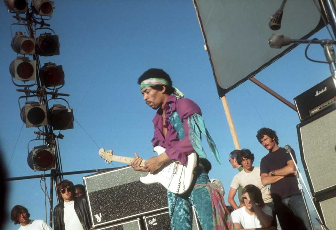 Jimi Hendrix performs onstage with his Fender Stratocaster electric guitar at the Newport Pop Festival in Devonshire Downs, California. Jimi Hendrix performs onstage with his Fender Stratocaster electric guitar at the Newport Pop Festival in Devonshire Downs, California.