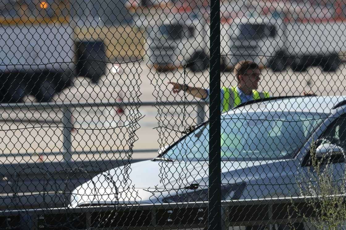 Climate protesters cut their way onto the tarmac at Germany's busiest airport in Frankfurt