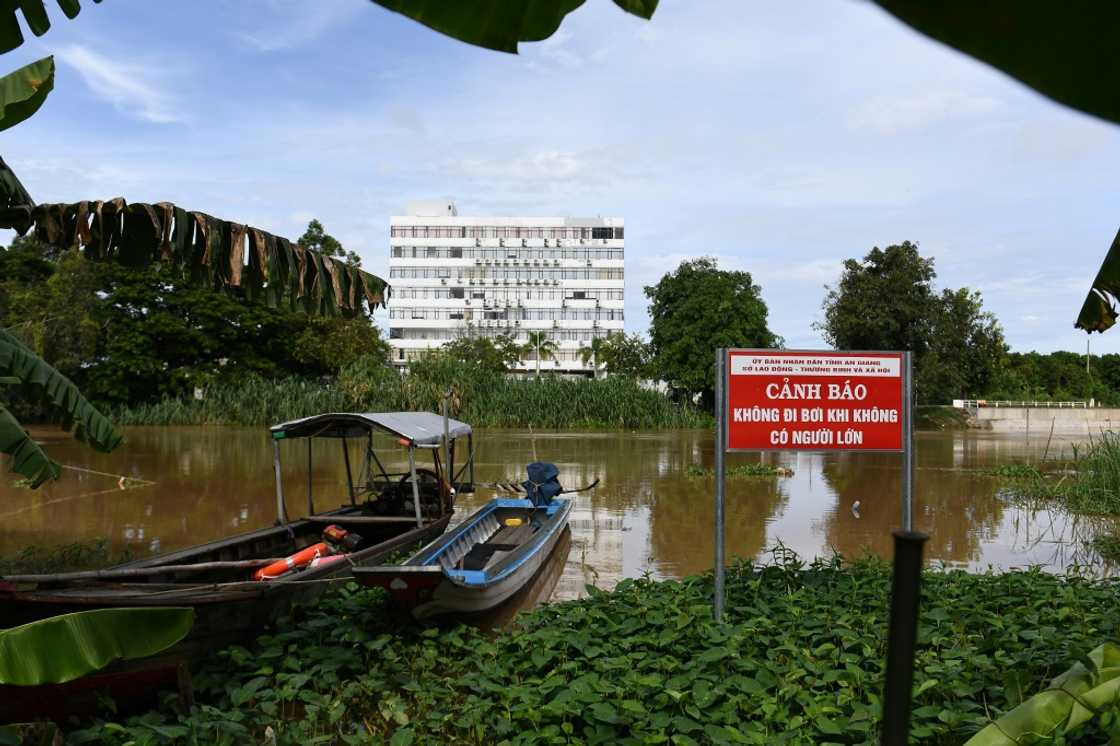 The Binh Di River that Vietnamese forced labour workers swam across in August after escaping a scamming gang based in a casino in Kandal province in Cambodia The Binh Di River that Vietnamese forced labour workers swam across in August after escaping a scamming gang based in a casino in Kandal province in Cambodia