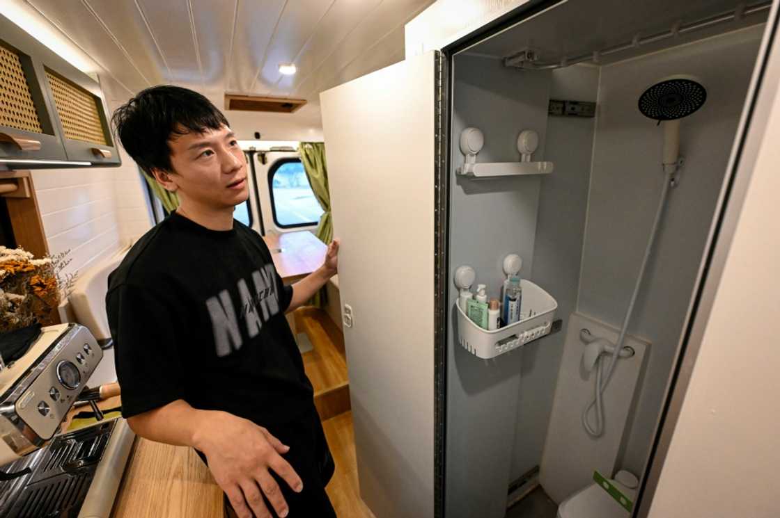 Zhang Xi started living in an RV with his partner last May before opening a van renovation workshop Zhang Xi started living in an RV with his partner last May before opening a van renovation workshop