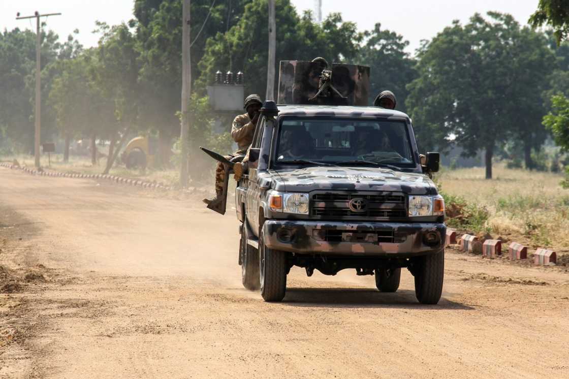 Nigeria's security forces are overstretched on several fronts, including a grinding 13-year jihadist war in the northeast Nigeria's security forces are overstretched on several fronts, including a grinding 13-year jihadist war in the northeast