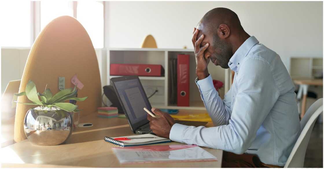 Photo of Black man thinking