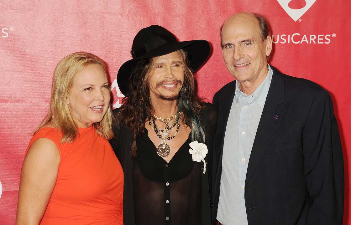 Kim Taylor, Steven Tyler and singer James Taylor attend the MusiCares Person Of The Year honouring Carole King at the Los Angeles Convention Centre Kim Taylor, Steven Tyler and singer James Taylor attend the MusiCares Person Of The Year honouring Carole King at the Los Angeles Convention Centre