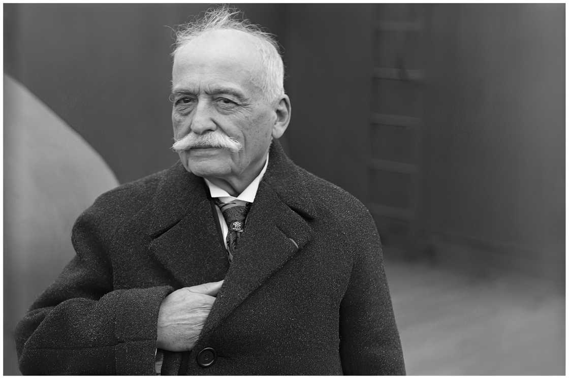 Auguste Escoffier is shown standing on a ship Auguste Escoffier is shown standing on a ship