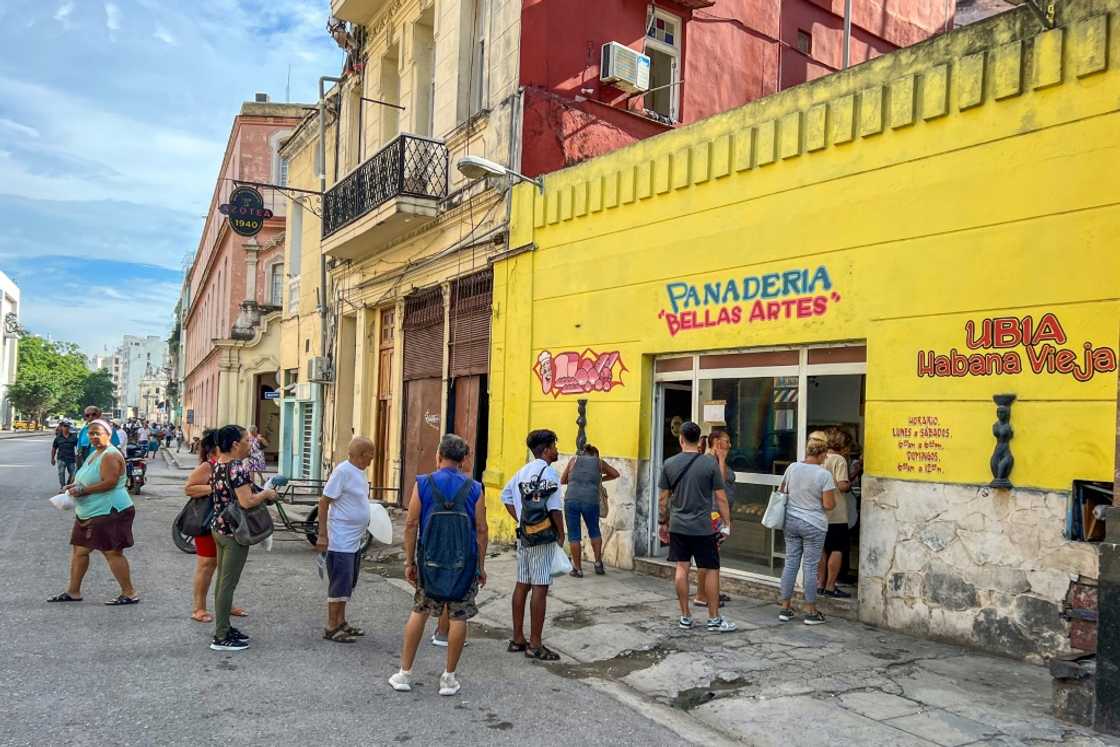 Cubans have become accustomed to queuing for food Cubans have become accustomed to queuing for food