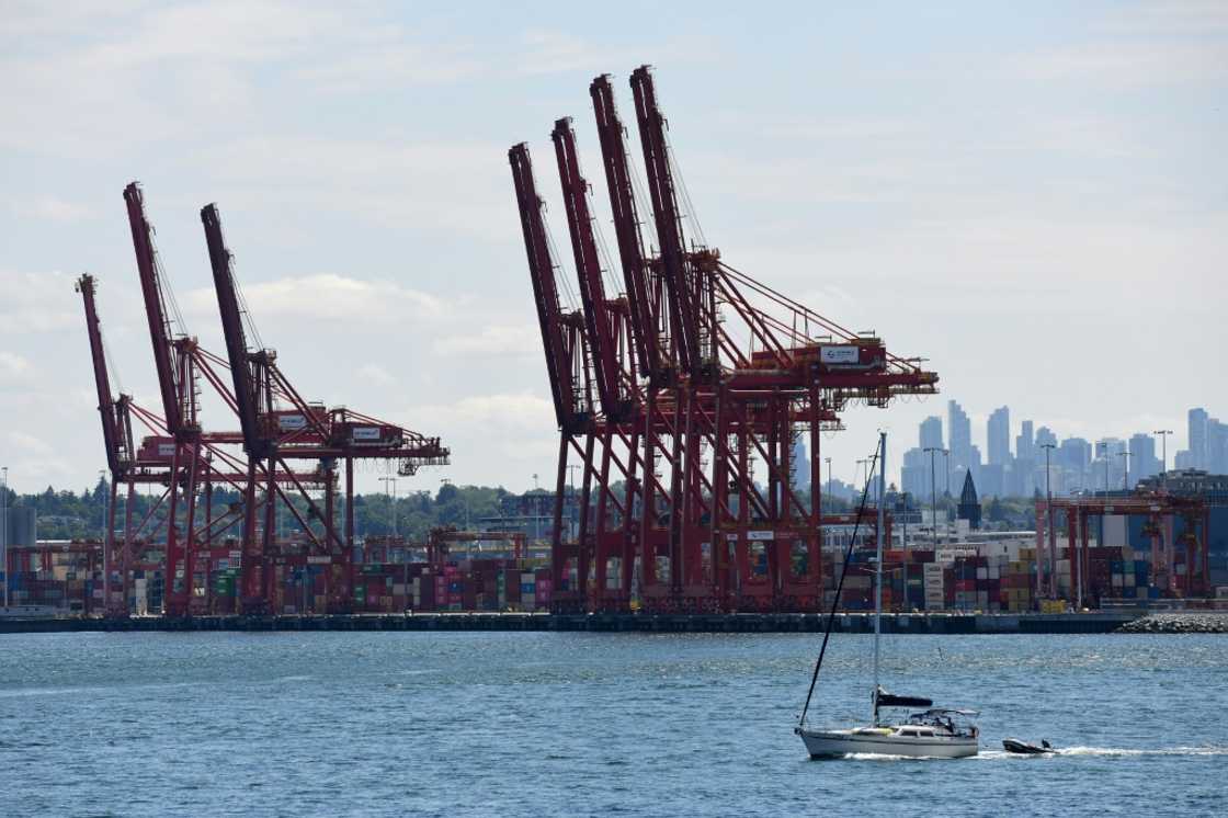Cranes and containers at the DP World marine terminal at Port Metro Vancouver on July 11, 2023 Cranes and containers at the DP World marine terminal at Port Metro Vancouver on July 11, 2023