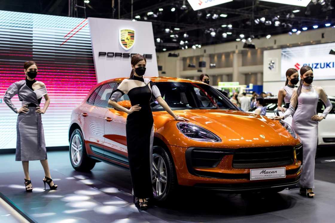 The mega IPO comes as Porsche beefs up its electric ambitions with an electric version of the Macan, seen here at the Thailand International Motor Expo, due in 2024 The mega IPO comes as Porsche beefs up its electric ambitions with an electric version of the Macan, seen here at the Thailand International Motor Expo, due in 2024