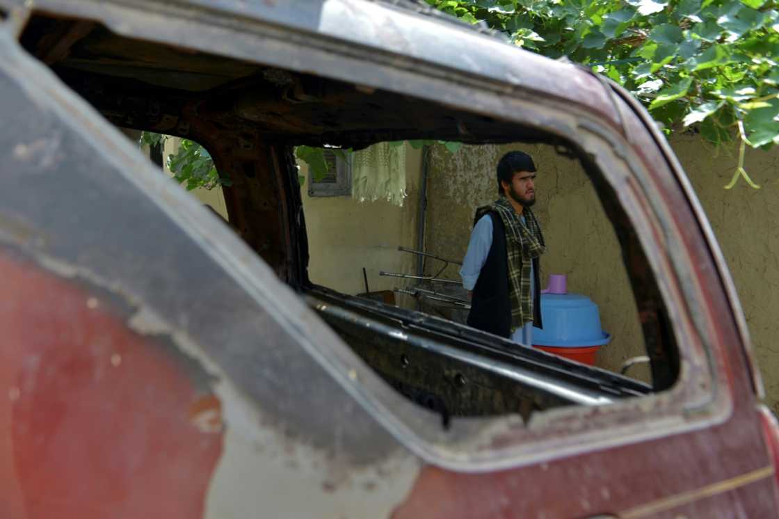 'We didn't want to get rid of it in memory of the victims and because it saved lives by protecting the women inside the house from the shrapnel,' said Ahmadi's 20-year-old nephew, Nasratullah Malikzada, who is now in charge of maintaining the house 'We didn't want to get rid of it in memory of the victims and because it saved lives by protecting the women inside the house from the shrapnel,' said Ahmadi's 20-year-old nephew, Nasratullah Malikzada, who is now in charge of maintaining the house