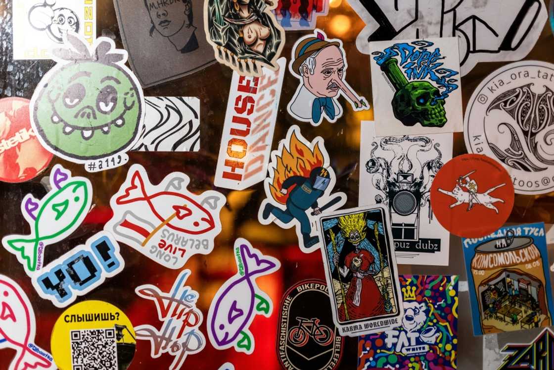 Exiles leave stickers in the bar, showing, among others, the Belarus president with the nose of a Pinocchio and a burning riot police officer Exiles leave stickers in the bar, showing, among others, the Belarus president with the nose of a Pinocchio and a burning riot police officer