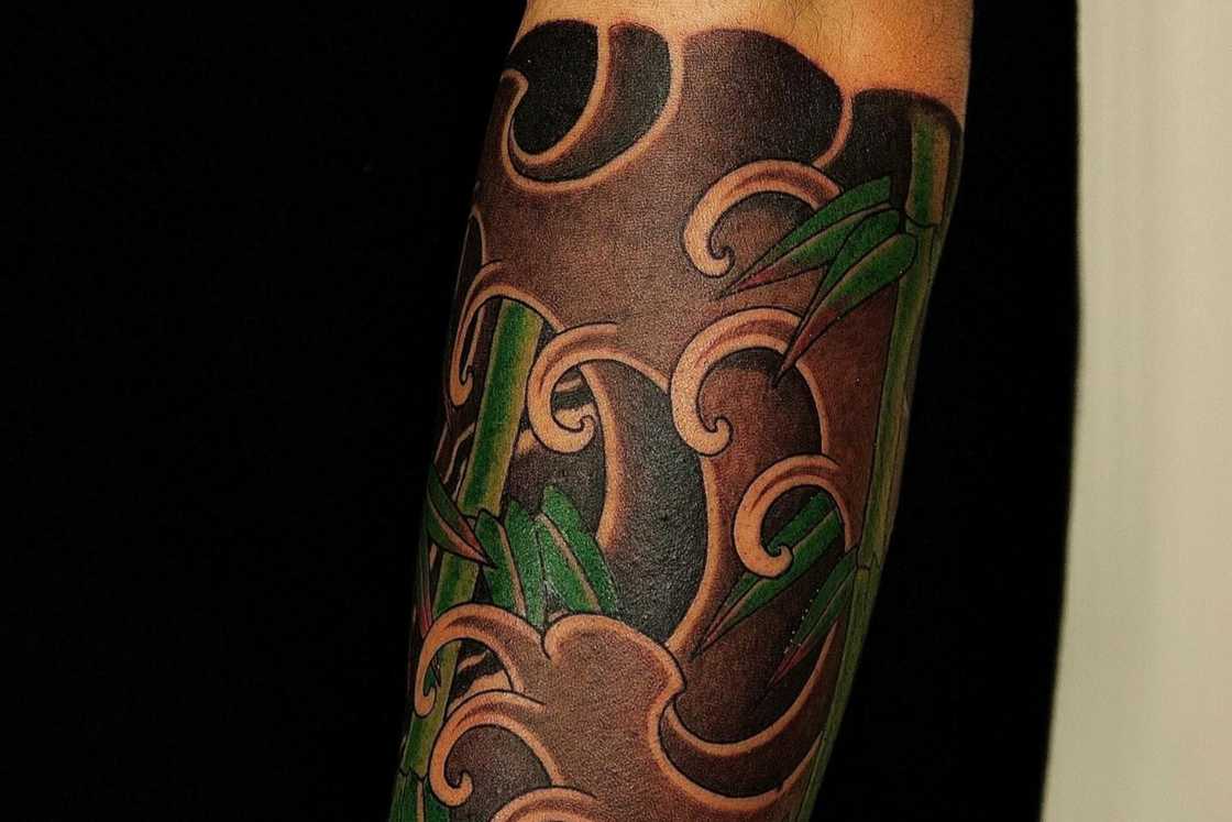 Simple and elegant Japanese bamboo tattoo Simple and elegant Japanese bamboo tattoo