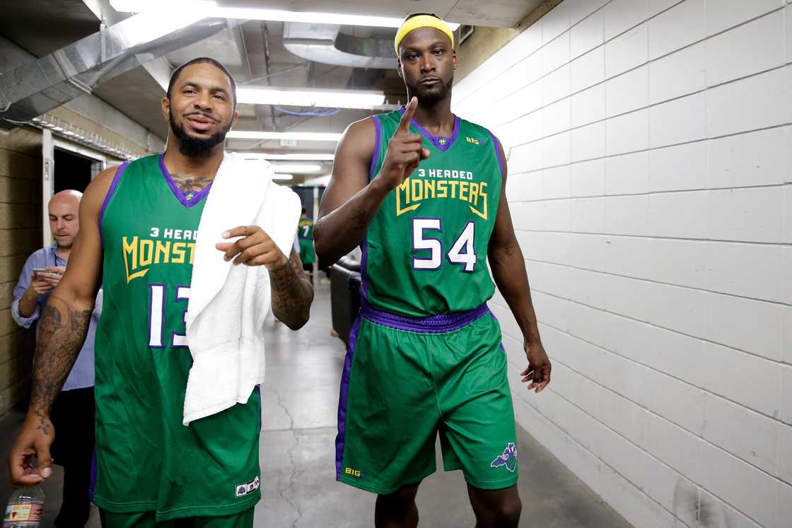 Eddie Basden #13 (L) and Kwame Brown #54 (R) of 3 Headed Monsters