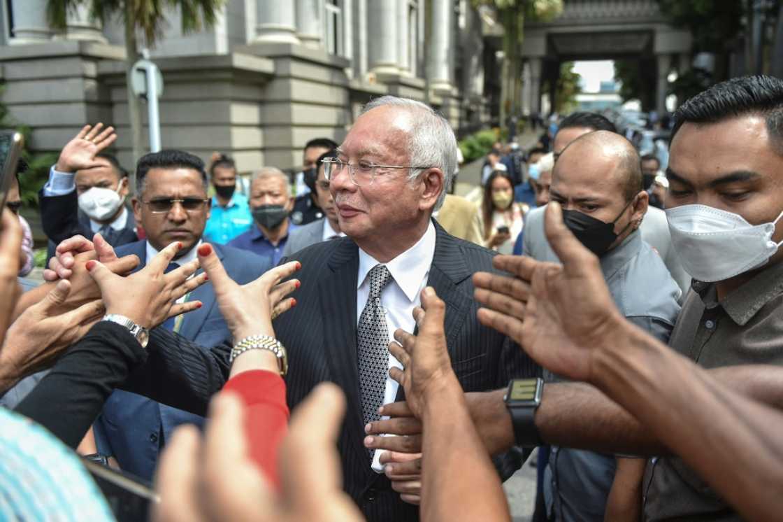 Malaysia's highest court Tuesday upheld former prime minister Najib Razak's 12-year jail sentence for corruption in the 1MDB financial scandal Malaysia's highest court Tuesday upheld former prime minister Najib Razak's 12-year jail sentence for corruption in the 1MDB financial scandal