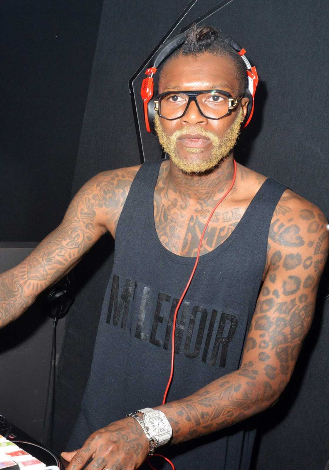 Djibril Cisse tattoos, most tattooed footballers, football players with tattoos, football stars body art, inked footballers, tattooed football legends, famous footballers with tattoos, tattoo stories in football, footballers personal tattoos