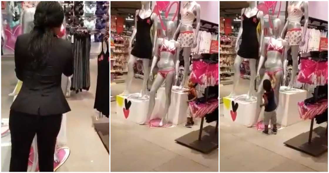 Curious boy inspects dummy. Curious boy inspects dummy.