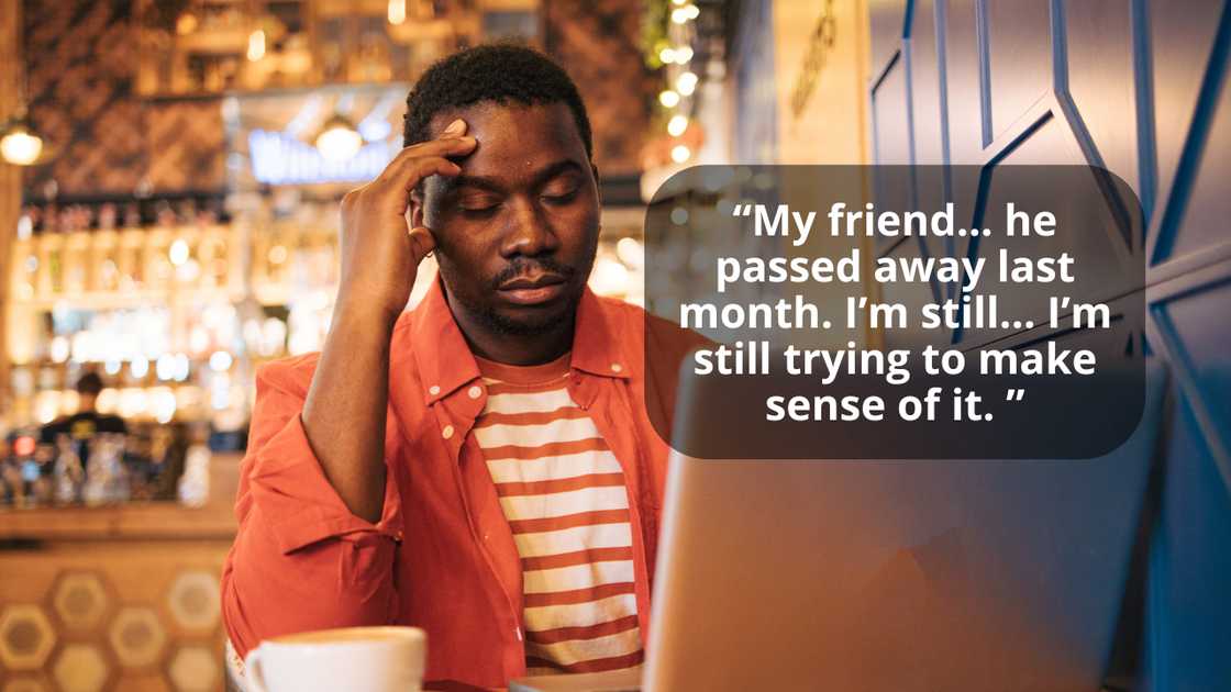 A stressed man at a cafe