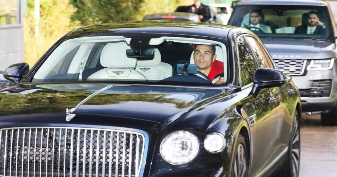 Ronaldo drove a top-spec Bentley Flying Spur as he arrived for Man United training. Photo: The Sun. Ronaldo drove a top-spec Bentley Flying Spur as he arrived for Man United training. Photo: The Sun.