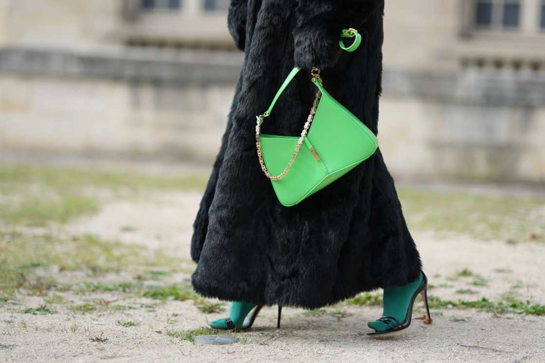 A green Givenchy bag is seen during the Paris Fashion Week in Paris, France. A green Givenchy bag is seen during the Paris Fashion Week in Paris, France.