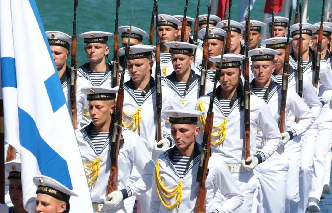 Russian naval sailors march during Russia's Navy Day celebration in Sevastopol in Crimea in 2017 Russian naval sailors march during Russia's Navy Day celebration in Sevastopol in Crimea in 2017