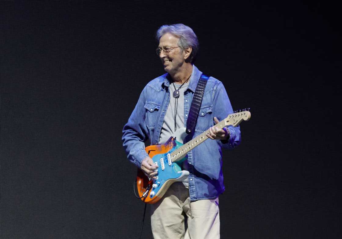 Eric Clapton performs onstage during Day 2 of Eric Clapton's Crossroads Guitar Festival at Crypto Arena in Los Angeles, California. Eric Clapton performs onstage during Day 2 of Eric Clapton's Crossroads Guitar Festival at Crypto Arena in Los Angeles, California.