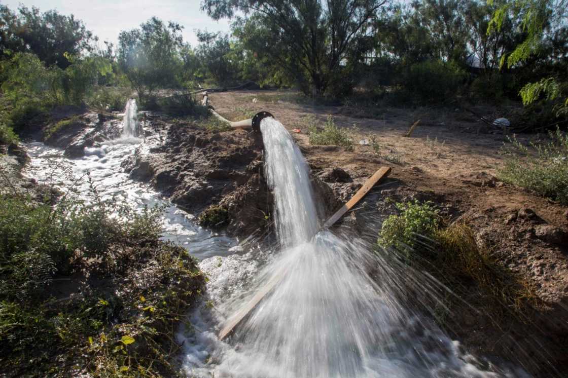 Water is pumped out of a flooded Mexican coal mine where 10 workers are trapped Water is pumped out of a flooded Mexican coal mine where 10 workers are trapped