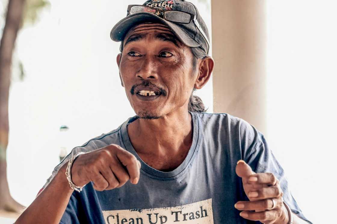 "I live in worry. I fear that when I am asleep, the water will suddenly rise," says Arif Pujianto