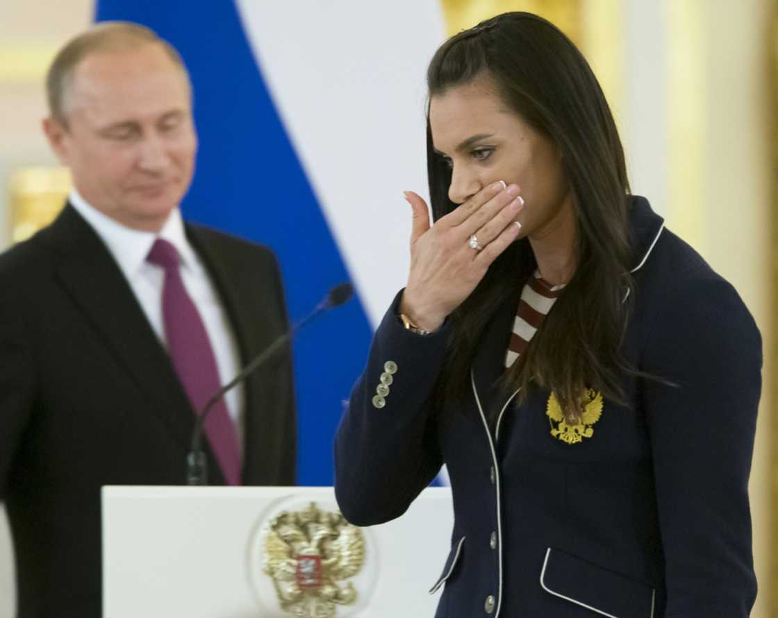 Russian pole vaulter Yelena Isinbayeva, a member of the International Olympic Committee, wipes a tear during a reception by President Vladimir Putin for Olympic athletes at the Kremlin in July 2016 Russian pole vaulter Yelena Isinbayeva, a member of the International Olympic Committee, wipes a tear during a reception by President Vladimir Putin for Olympic athletes at the Kremlin in July 2016