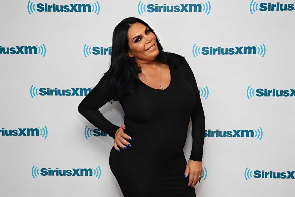 Renee Graziano in a black dress